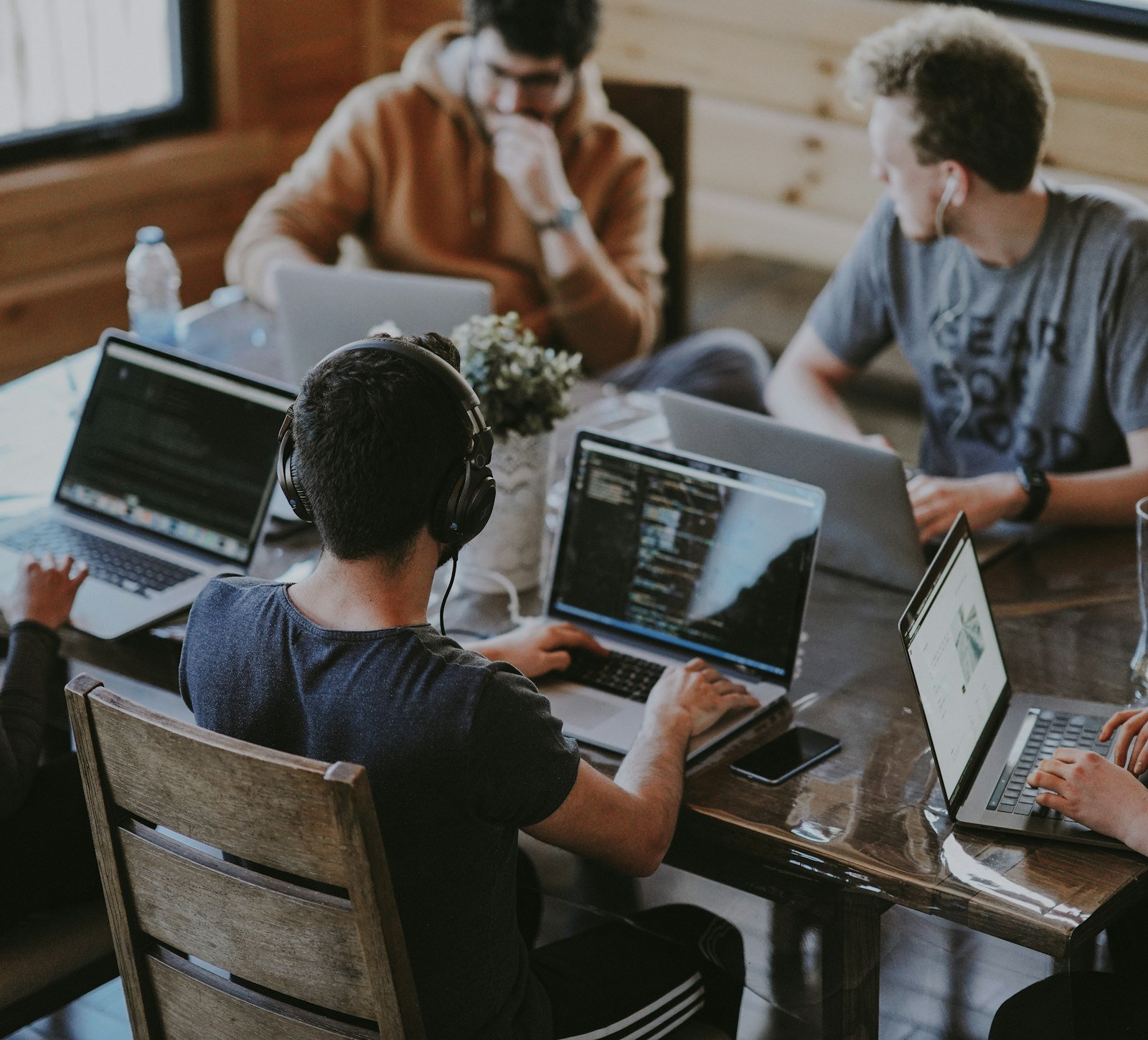 Team working together around a shared table